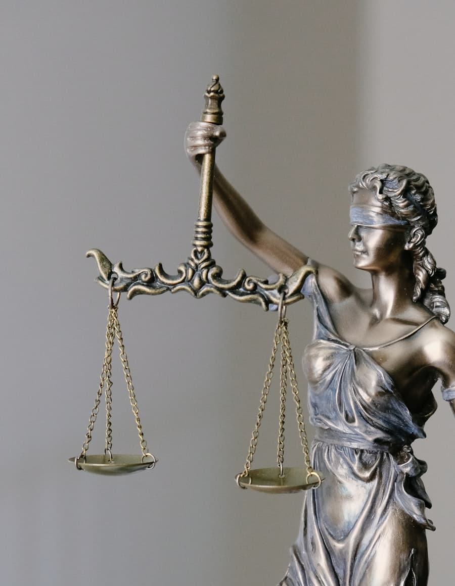 Lady Justice, bronze figure holding scales and sword